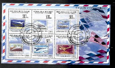 GUINEA -známka na známce- letadla - Concorde, vzducholoď Graf Zeppelin
