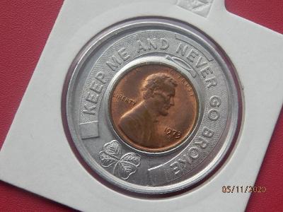 Hliníkový žeton v kombinaci s mincí One Cent 1973 D.