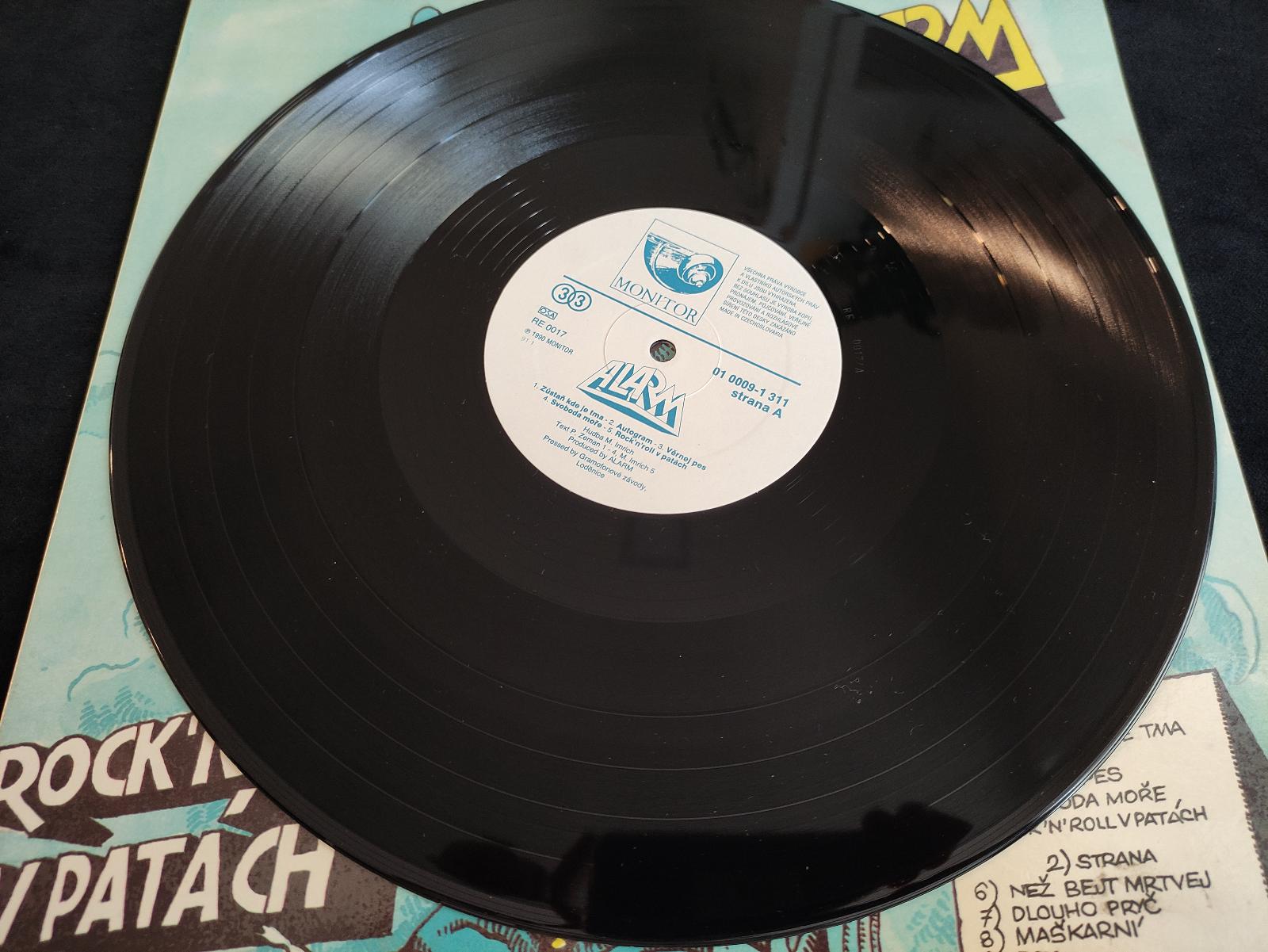 Alarm (M. Imrich) - Rock 'n' roll v patách, (cover Saudek) 1990 - LP / Vinylové desky
