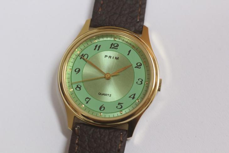 Pánské hodinky PRIM Quartz, zelený číselník, nenošené