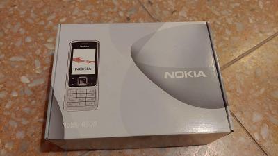 Mobilní telefon Nokia 6300 stříbrný