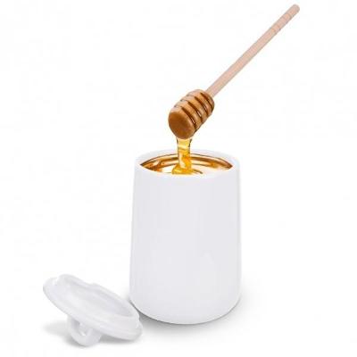 Bílá porcelánová dóza na med se lžičkou