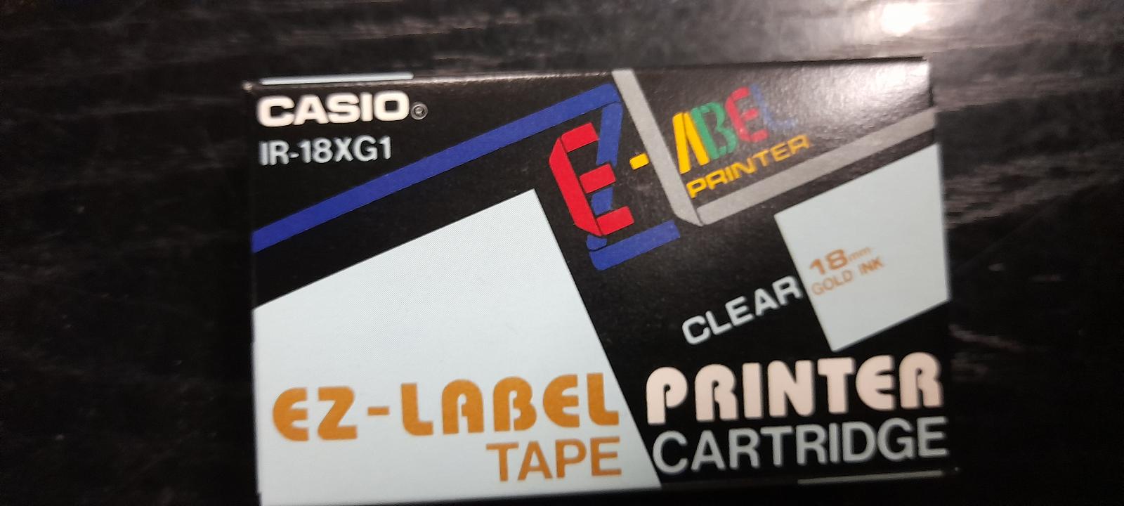Popisovacia páska CASIO EZ-LABEL IR-18XG1 18mm Clear, Gold Ink - Tlačiarne, príslušenstvo