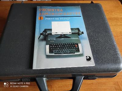 Psací stroj a učebnice psaní na stroji