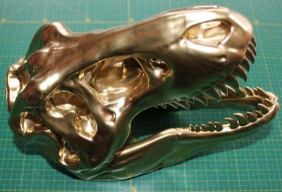 Tyranosaurus REX - zlatá lebka s čelistí