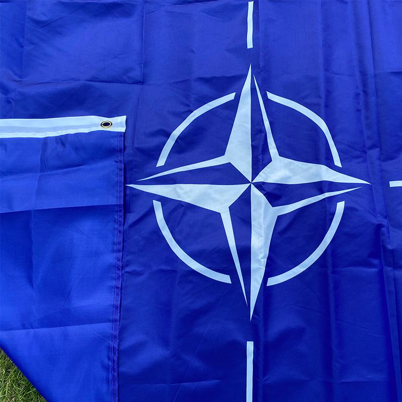 Vlajka NATO Severoatlantická al. Rozmer 90*150 cm. Materiál polyester. - undefined
