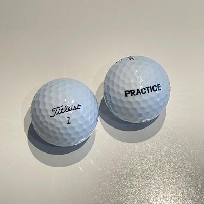 Dva Golfové míčky Fitleist practice