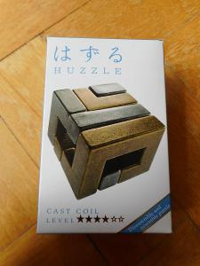 Hlavolam Huzzle Cast Coil od značky Hanayama