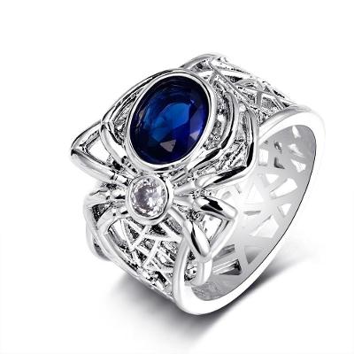 Krásný prsten s modrým safírem s motivem pavouka pro štěstí. Nenošený.