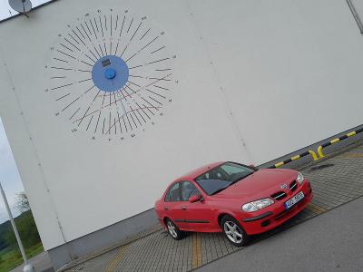 Nissan Almera 1.5 červená barva