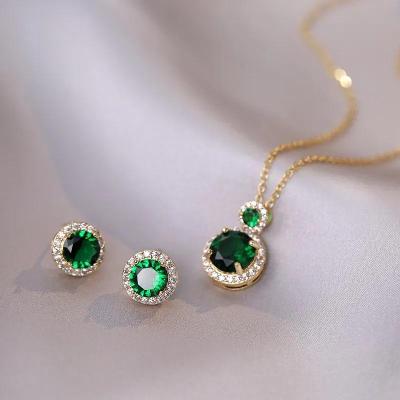 Zlatý řetízek náhrdelník náušnice se zeleným kamínkem 