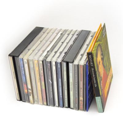 Směs cca 12+ titulů na kompaktních discích CD - Edith Piaf, Gott, ...