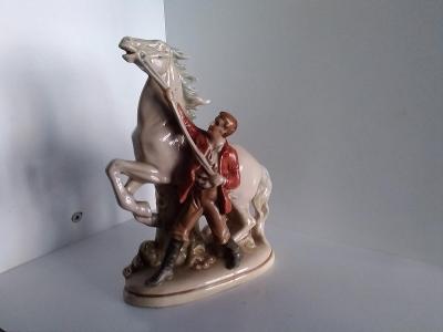 Porcelánová figurka - sousoší jezdec s koněm- Německo.