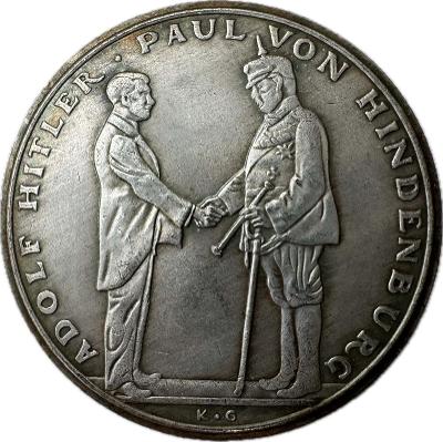 Historická kopie medaile zobrazující Garnisonkirche a den 21. 1933