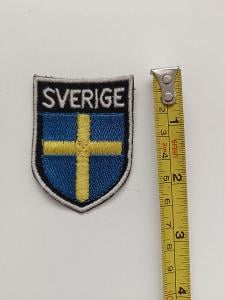 Modrá nášivka - Švédsko a neznámý znak