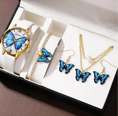 Dámské hodinky s modrým motýlem + 4 kusy šperků zdobené motýli