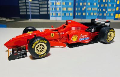 Model Formule F1 FERRARI SCHUMACHER 1996 1:24 BBURAGO (MINICHAMPS ONYX