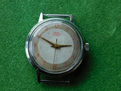 Náramkové hodinky zn. PRIM  jdoucí vyčištěné prům. cif. 3,1 cm tl. 1 c