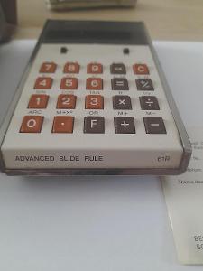 Kalkulačka Rockwell  61R kompletní včetně návodu paragonu pouzdra