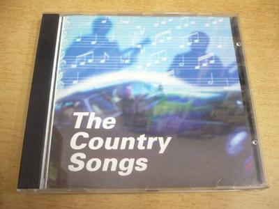 CD THE COUNTRY SONGS ( Jennings, Cash, Laine, Travis...)
